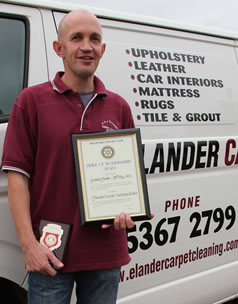 Graham Elander of Elander Carpet Cleaning with his Workmanship Award